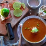 bowl of sweet potato soup with dollop of whipped cream